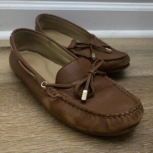 Michael Kors Daisy Leather Cushioned Tied Moccasins in Brown with Gold Hardware